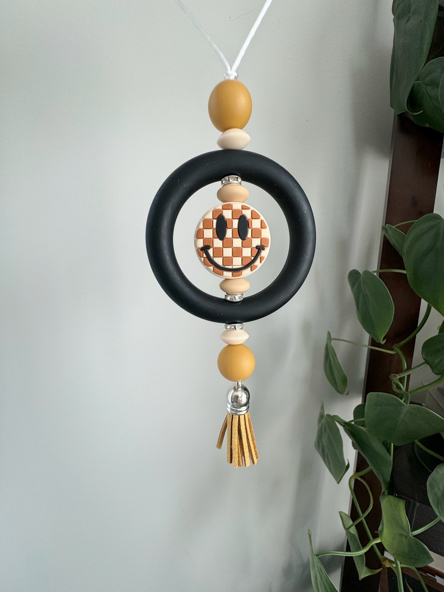 Smiley Babe Black + Tan Car Charm